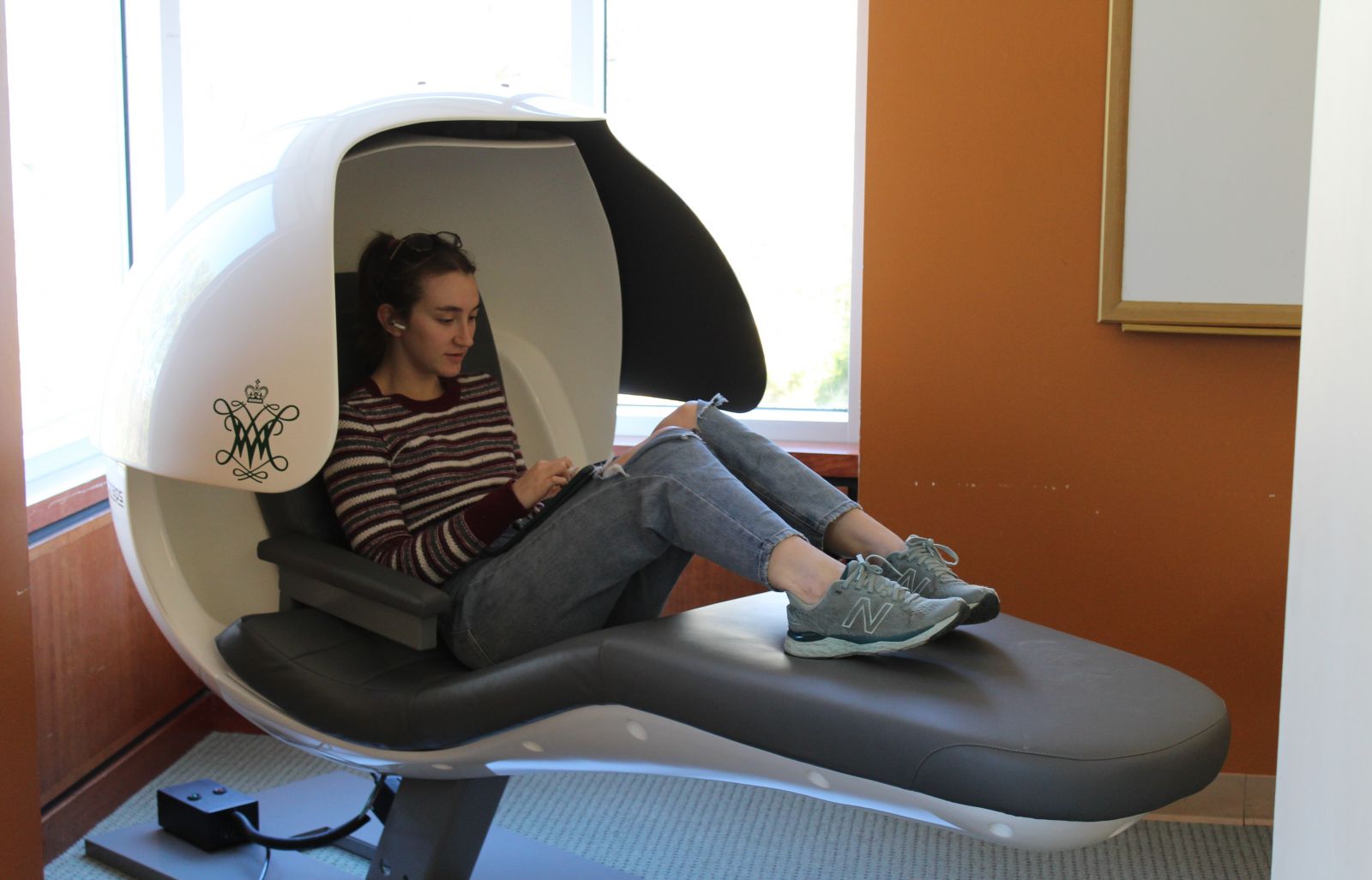 Student sitting in energy pod