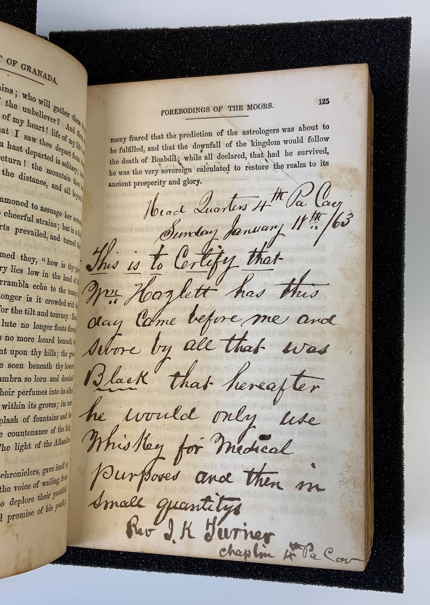 A handwritten note added to the end of the printed text on page 125 of the Conquest of Granada. Signed Rev. J.K. Tuner, Chaplain.