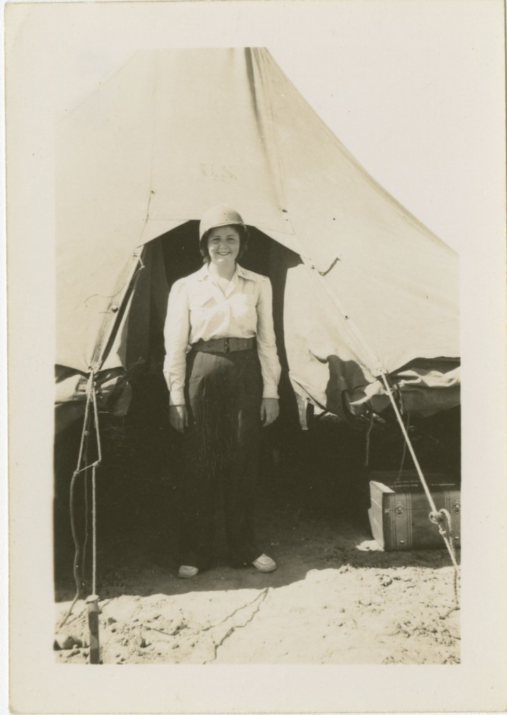 Mary posing in front of an army tent (Mss. Acc. 2006.65, Series 3, Box 2, Folder 23)