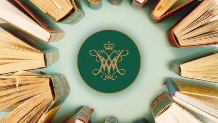 The William and Mary cypher surrounded by books