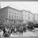 Black and white photograph of a crowd, comprised mostly of Black Americans, marching down a street in Richmond, Virginia.