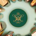 The William and Mary cypher surrounded by books