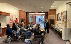 Dr. Danielle Moretti-Langholtz gives lecture in lobby of Special Collections
